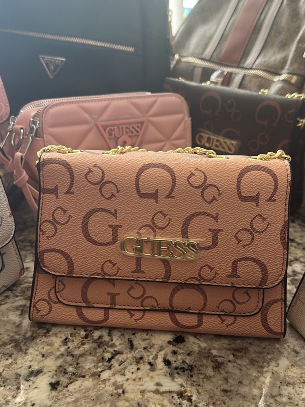 GUESS Logo-Print Chain Strap Crossbody in Light Brown with Dark Brown Accents